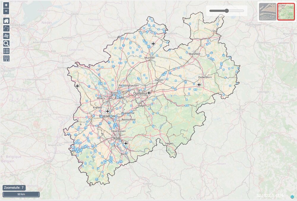 Map of North Rhine-Westphalia showing towns, roads and markers for commercial areas.