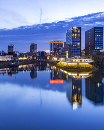 Düsseldorf Media Harbour with modern architecture along the riverside.