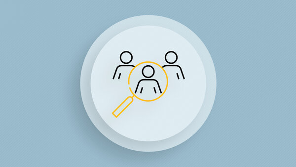 Symbolic image with three people, with a magnifying glass above them.